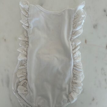 The cutest frilled party romper 12-18mnths