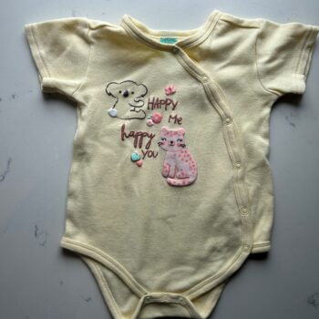 Embossed cotton romper 6-12mnths